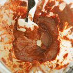 Creamy vegan chocolate hazelnut spread blended smooth in a blender viewed from above