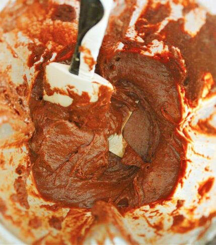 Creamy vegan chocolate hazelnut spread blended smooth in a blender viewed from above