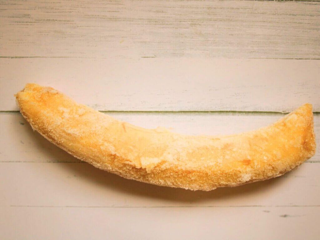 Whole frozen banana used for açaí berry smoothie bowl