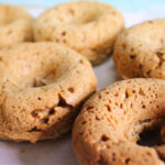 Soft vegan chestnut donuts with warm fall spices, fresh from the oven.