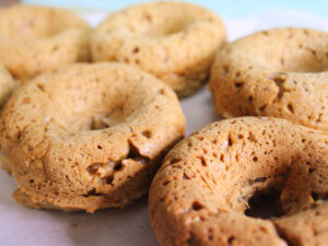 Soft vegan chestnut donuts with warm fall spices, fresh from the oven.