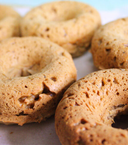 Soft vegan chestnut donuts with warm fall spices, fresh from the oven.