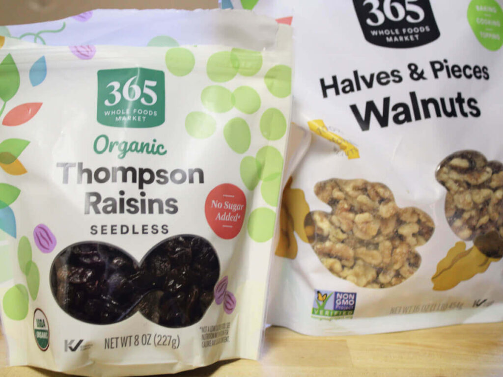 Packages of raisins and walnuts from Whole Foods for banana bread breakfast cookies