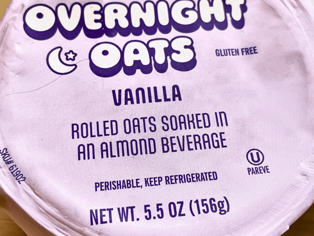 Prepackaged vanilla overnight oats for kids from Trader Joe’s in a clear container for a quick kid-friendly breakfast option