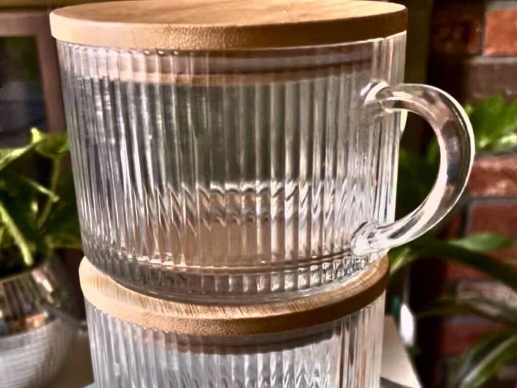 Stacked empty glass jars with handles for preparing overnight oats for kids at home