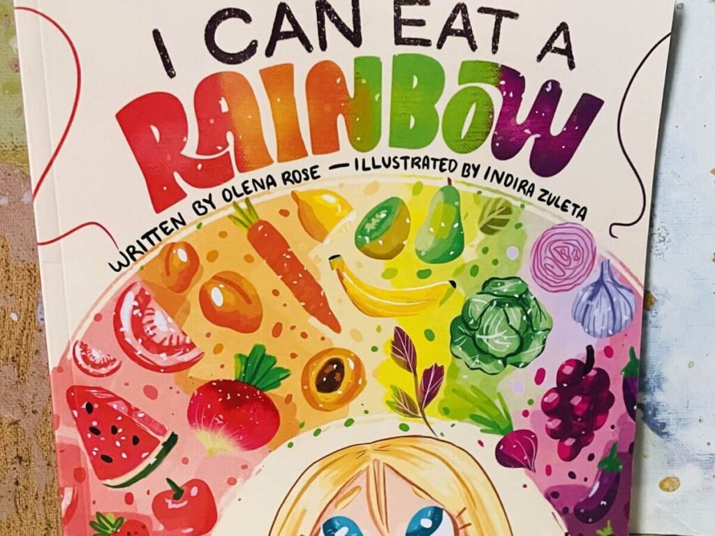 I Can Eat a Rainbow children’s book by Olena Rose, featured in the Messy Little Readers Library to encourage kids to explore colorful foods.