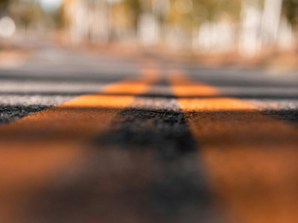 Blurred road lines in soft focus representing shifting boundaries and changing consumer habits