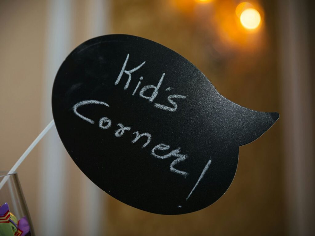 “Kids corner” sign showing how food environments are designed specifically for children
