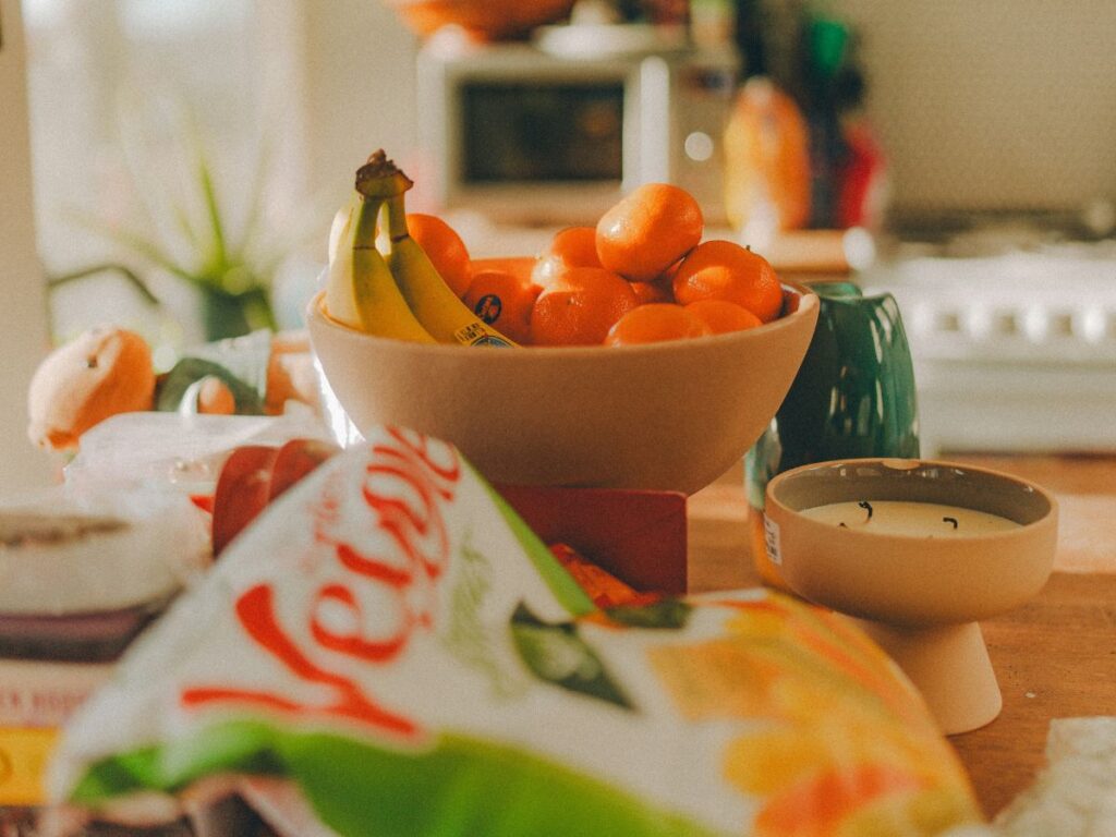 Everyday kitchen counter with fruit and snacks illustrating how food is presented at home